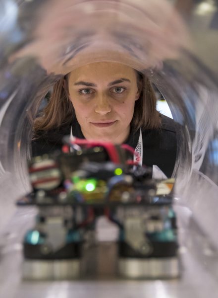 Woman looking at model of the rLoop hyperloop pod