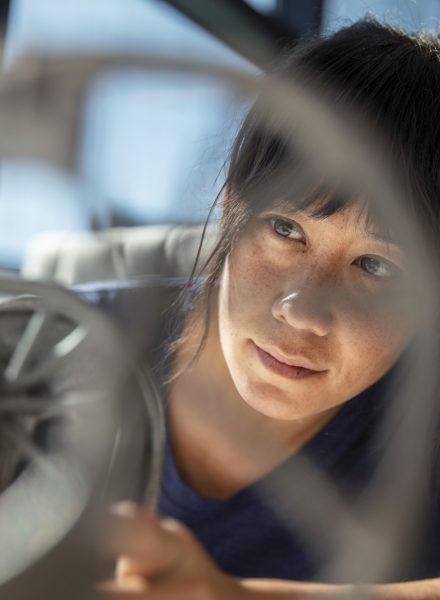 A woman looking at something intently