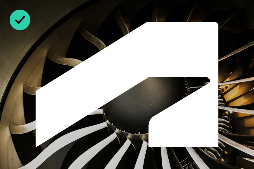Example of correct usage of The Window, wherein the Autodesk symbol is shown in white on top of a photo of a turbine. The symbol neatly frames the underlying image.