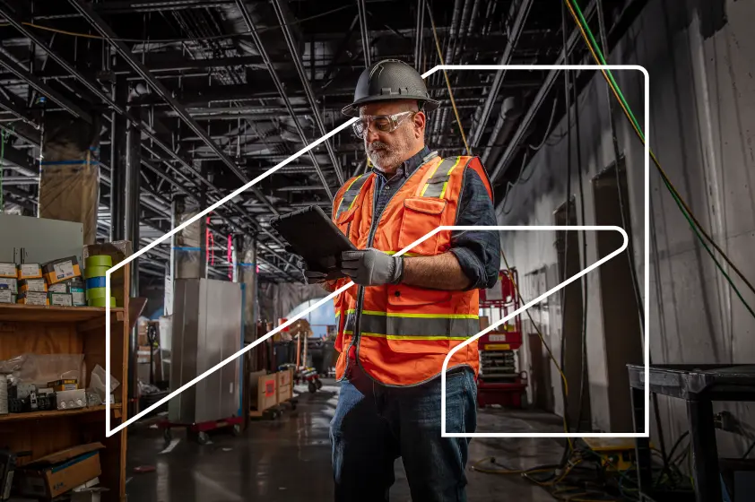 Example of The Thread, a visual device consisting of an outlined Autodesk Symbol. Here, an abstract photo of a man in an industrial setting is used as a background image, and parts of the man intersect and overlap with the symbol